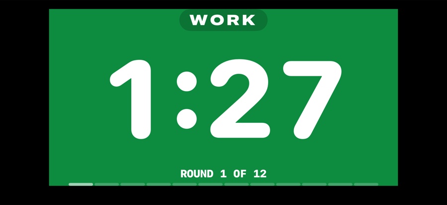 The gym TV scene: a large green work round countdown